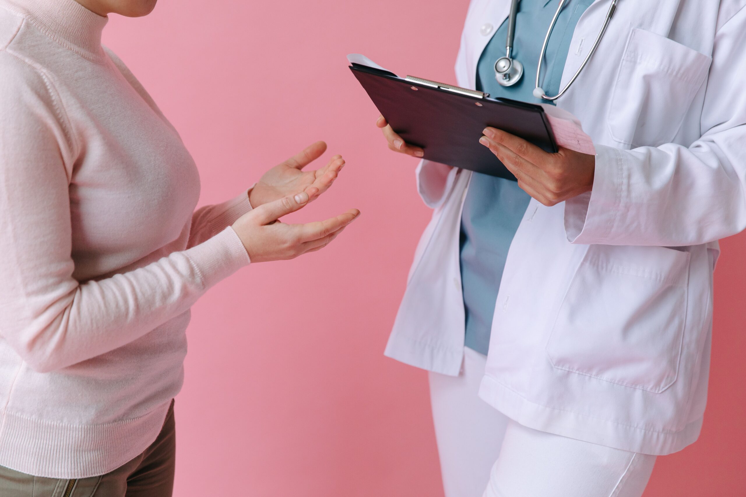 Patient discussing NAD+ therapy and wellness treatment with a healthcare provider