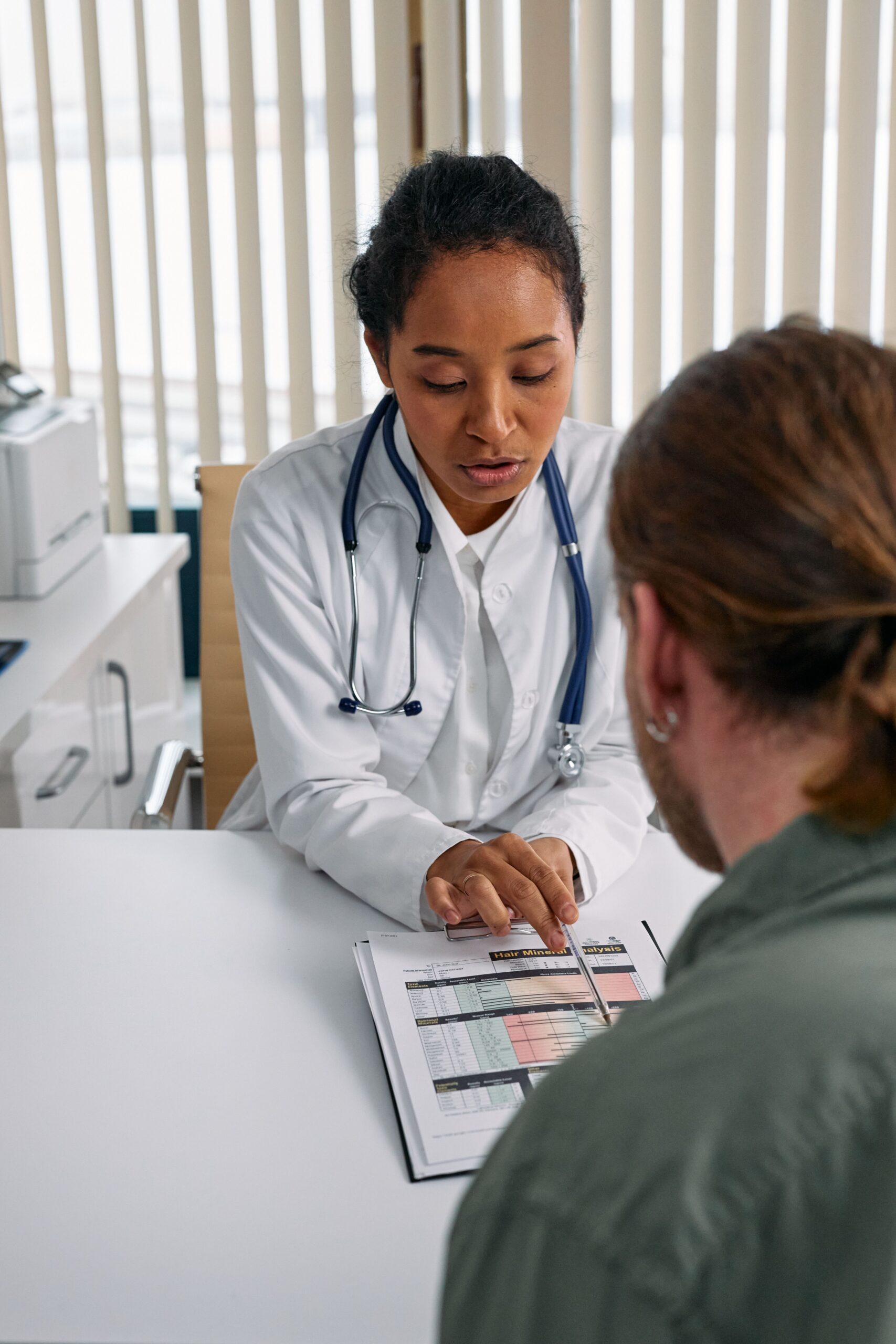 Patient discussing low energy and hormone optimization with a healthcare provider