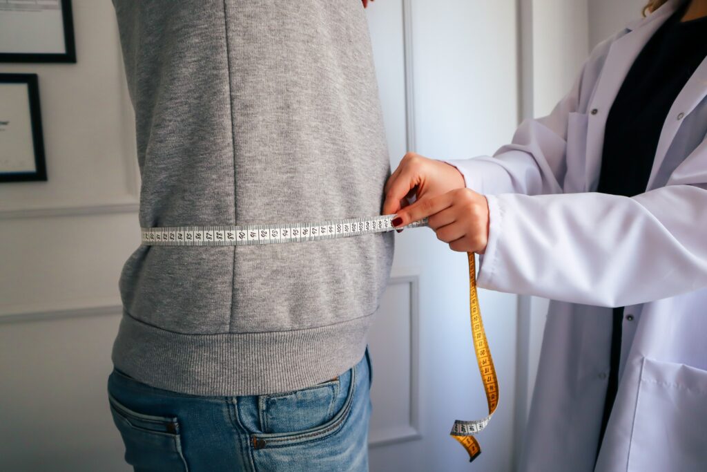 Patient discussing weight maintenance after GLP-1 weight loss with a healthcare provider